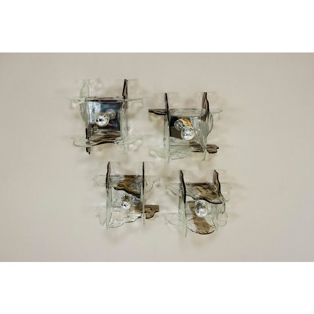 Carlo nason, born into a renowned murano glassmaking family, brought innovation to italian lighting. Collaborating with av...