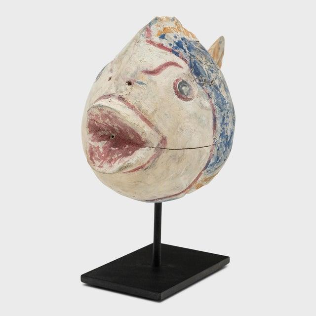 Hand-carved from reclaimed wood, this colorful koi fish is a traditional symbol of harmony, wealth and luck. The rustic...