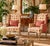 Beautiful pair of vintage Hollywood Regency-style wingback lounge chairs featuring elegant high backs, gracefully rolled...