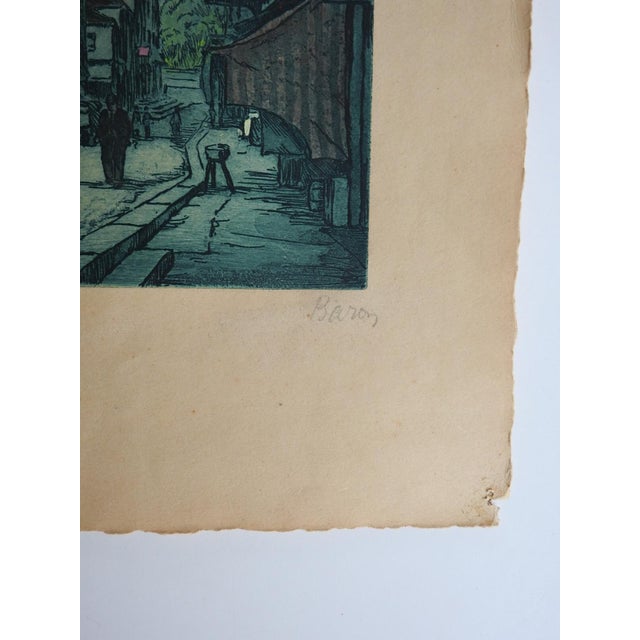 Mid 20th century colored etching on tan paper with hand colored accents by Marcel Julien Baron (1872-1956) France. Signed...