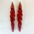 A pair of Christmas Candles from the Mid-Century featuring a large spiral design with Holly Leaf and Berry accents. They...