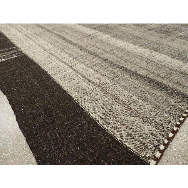 Galerie Shabab Collection Mid-20th Century Turkish Tribal Kilim Room Size Carpet in Charcoal and Brown For Sale - Image 9 of 10