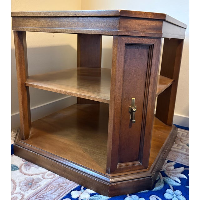 Presenting a gorgeous vintage 1960s–1970s octagonal two-tiered commode or "drum" style side table. This exceptionally...