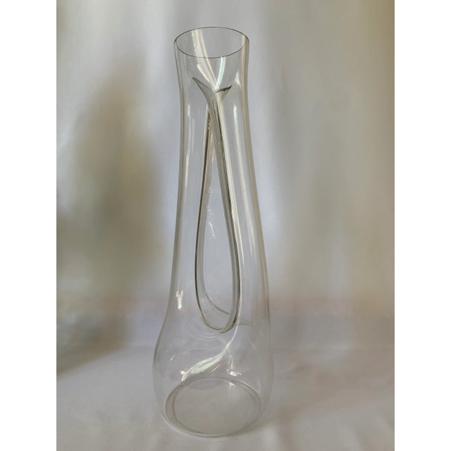 I purchased it in an Italian store in the design district of Miami in the late 80's. I believe is was made by Mazzega....