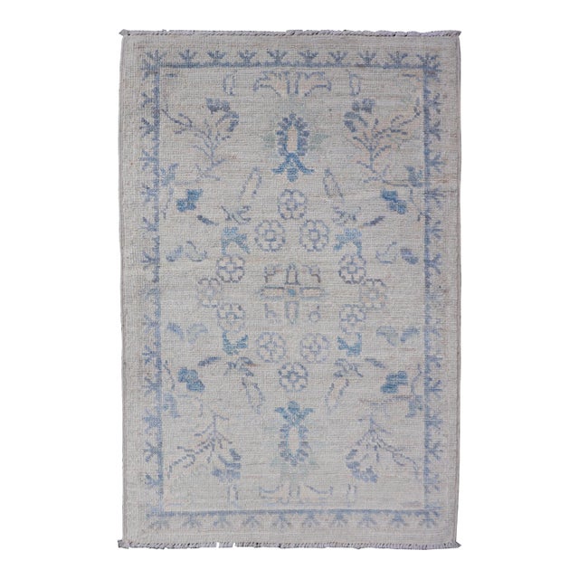 Modern Oushak Rug With Soft Ivory Base and Delicate Sky Blue Floral 1'10 X 3'0 For Sale