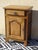 Solid oak top with rounded edges, sanded and varnished with a matte clear finish. One storage drawer with an aged metal...