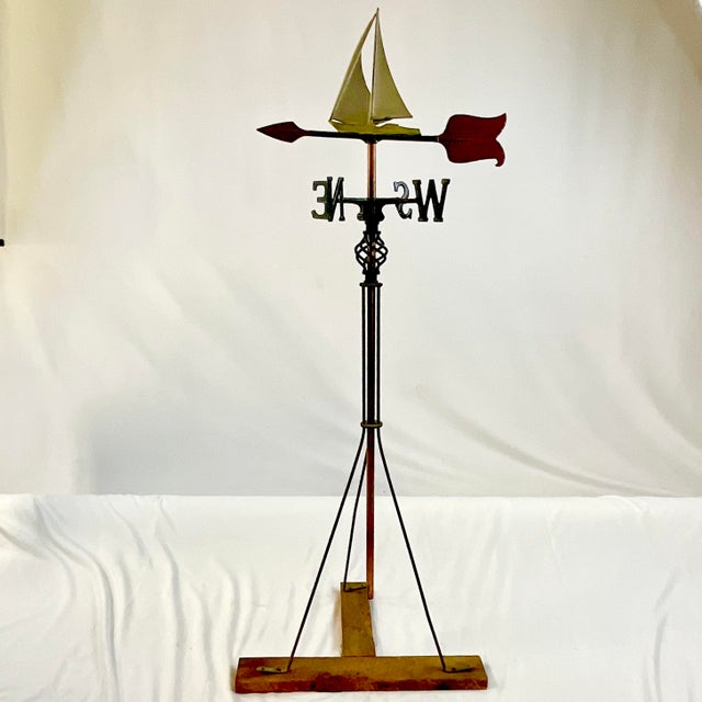 Weathervanes are such a part of Americana history. This one features a sailboat sitting on top of an arrow. This was...