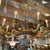 Make a statement with this elegant vintage six-light chandelier featuring a beautifully detailed gold gilt finish and...