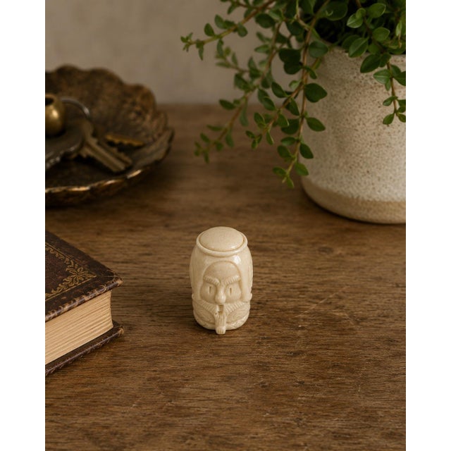 This finely hand-carved miniature male head bust originates from Poland and reflects traditional European artisan carving...