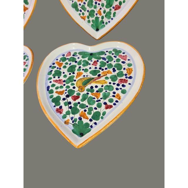 These 4 Italian Terra-Cotta Hand Painted Deruta Pottery Heart Shaped Luncheon Plates are a beautiful addition to any...