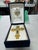 Beautiful vintage Fabergé jeweled cross featuring ornate gold-tone detailing, crystal embellishments, and deep blue...
