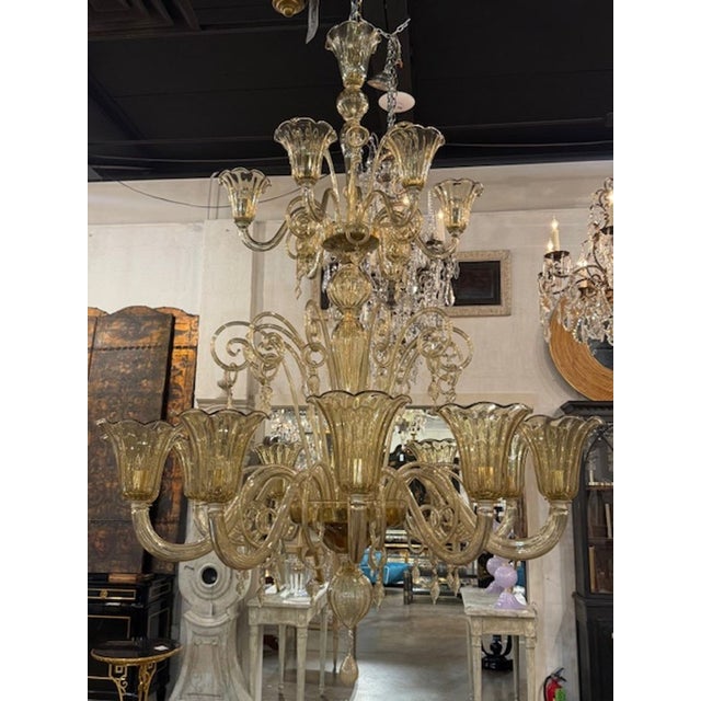 The large scale Murano glass chandelier is a modern and stylish lighting fixture designed for luxury homes and spaces....