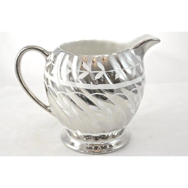 Vintage English platinum over ivory porcelain lusterware 16 oz. pitcher with a detailed vine pattern. Marked: “Sadler;...