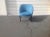 Modern mid century style club chair. Chair was upholstered in a blue chenille. Wood was stained in a matte black finish ....