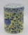 A stunning mid-20th century lidded porcelain jar with a canary yellow background, and blue flora and fauna design. Very...
