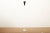 Ceiling floodlight, white marble base, white lacquered tubular steel frame, black sheet metal shade, E 27 socket, pedal...
