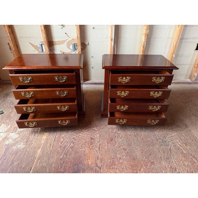 Pair of Late 20th Century Chippendale Four-Drawer Nighstands by Null Solid wood frame, brass hardware. Dovetail joints...