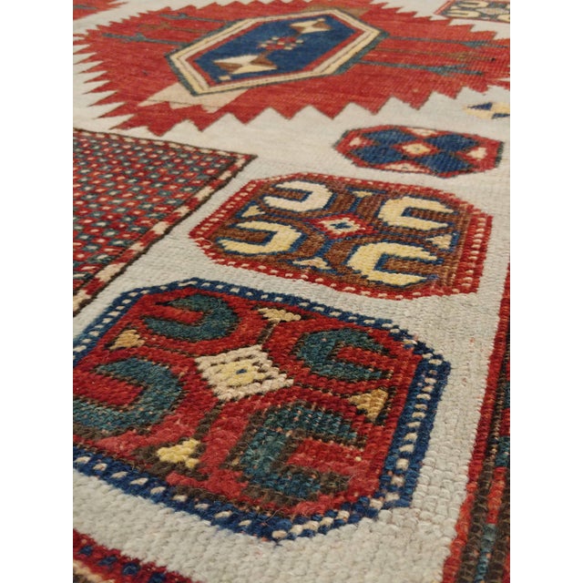 Karachov Kazak: A quite famous and seldom-found design type, usually attributed to the Armenian weavers of the high...