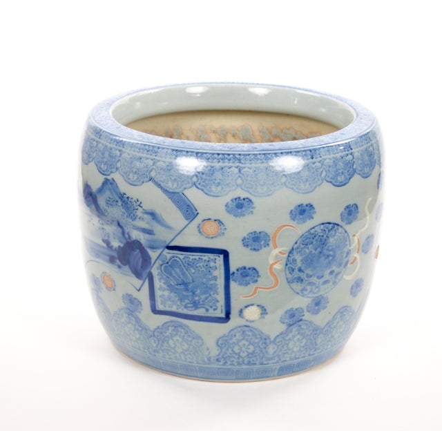 This elegant Asian blue-and-white porcelain vessel, dating to the late 20th century, features a generously proportioned...