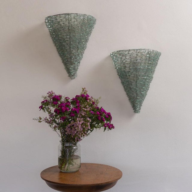 Stunning pair of large green glass sconces from Italy, 1960s. Half-round cylindrical form sconces with tapered bottom and...
