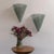 Stunning pair of large green glass sconces from Italy, 1960s. Half-round cylindrical form sconces with tapered bottom and...