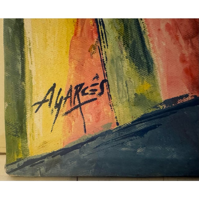 An abstract cubist-style painting depicting a bull’s head rendered in fragmented, faceted planes of color, warm reds,...