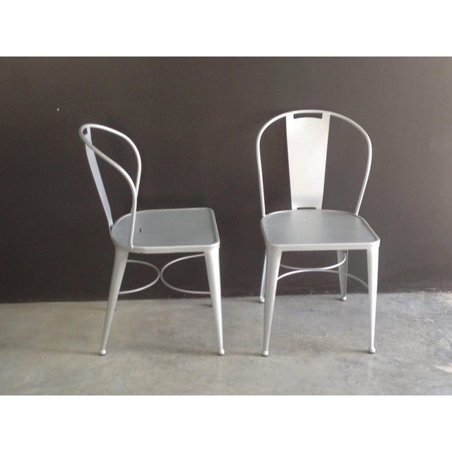 Pair of modern chairs in wrought Iron. Can be used indoors, or as garden furniture.