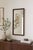Elegant Danish modern wall mirror by Dyrlund, Denmark, featuring a beautifully crafted rosewood frame with rich grain...