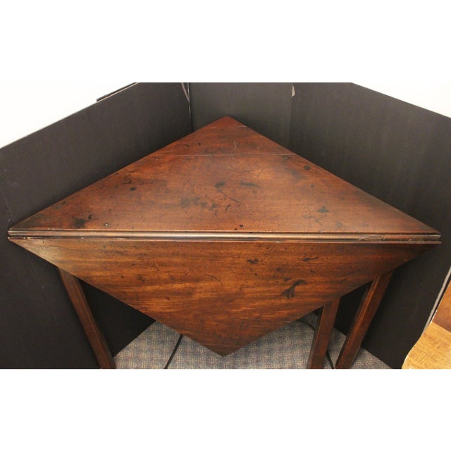 Circa 1760-1780 George III period Corner Table, English. Elegant & useful handkerchief form. Triangular drop leaf with...