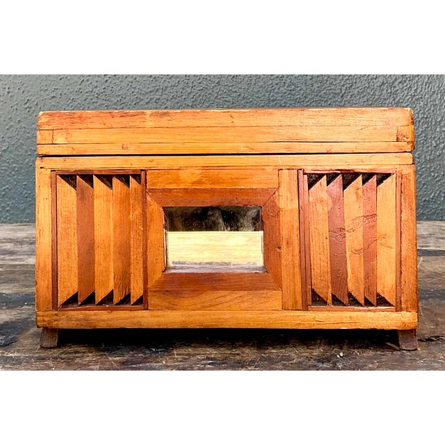 Embrace the soulful charm of American Folk Art with this unique vintage wooden keepsake box. Handcrafted with meticulous...