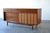Beautiful vintage walnut dresser by Hooker Furniture, featuring a striking mix of sculpted pull drawers and woven-front...