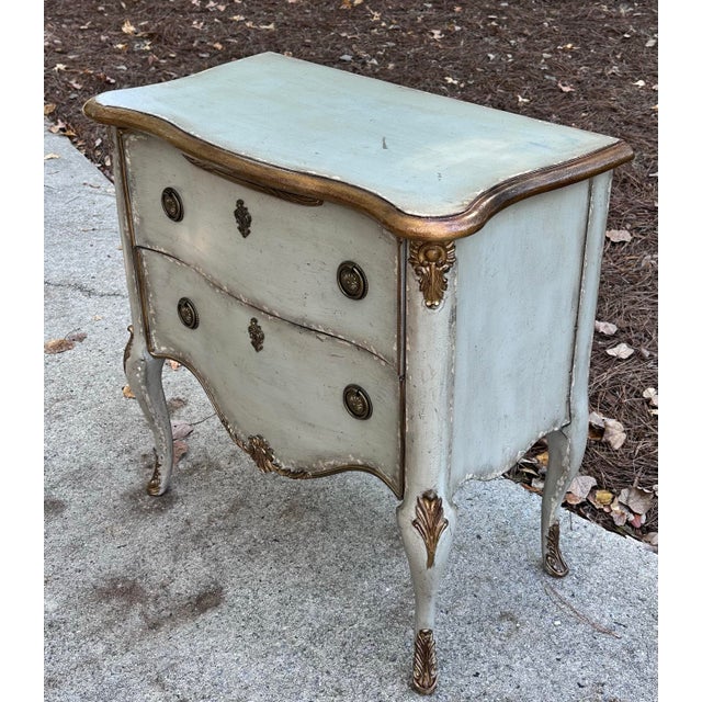 This is a nice French Louis XV style commode or nightstand by Hooker Furniture and sold by high end furniture companies....
