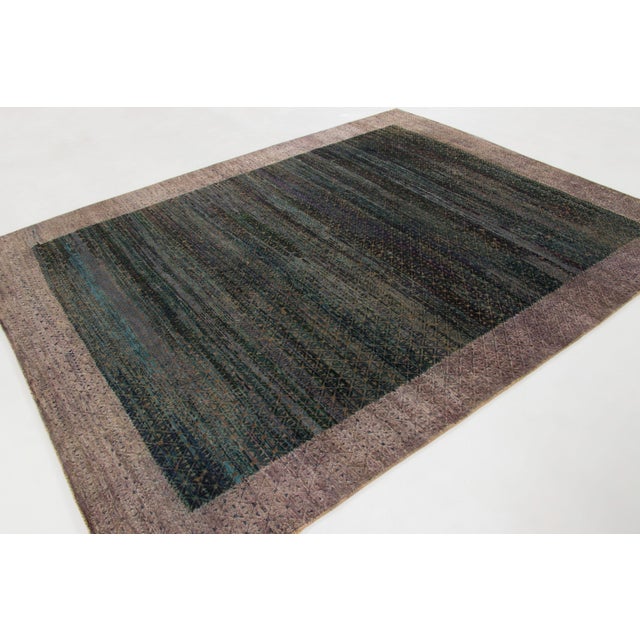 Hand-knotted in wool and natural silk, this 8x10 contemporary rug joins Rug & Kilim’s Modern collection. It features an...