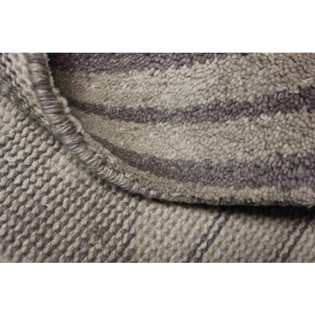 Its an amazing American design made in India with %75 wool %25 cotton. This beauty brings happiness and live in your room.