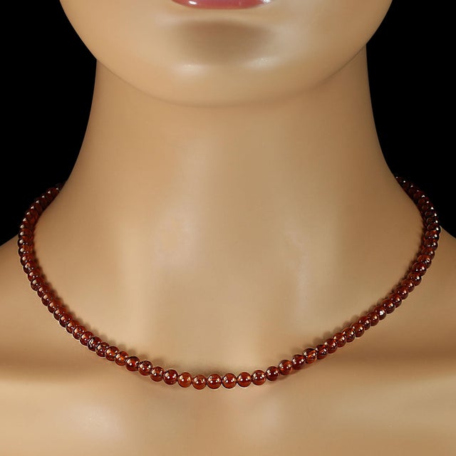 This elegant 18‑inch Hessonite Garnet necklace radiates a warm, glowing beauty that makes it a standout piece for any...