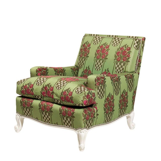 A glamorous Hollywood Regency lounge chair in the style of Billy Haines, featuring a low, generously cushioned silhouette...