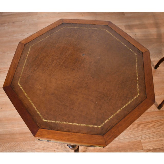 We are Pleased to offer this beautiful pair of English Regency side tables, from the 1930s. This pair is made of Mahogany...