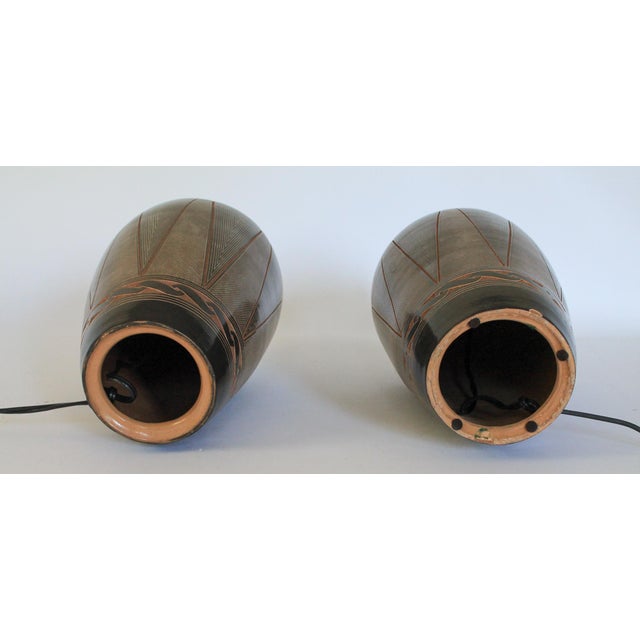 Vintage pair of geometric studio art pottery table lamps by artist Paula Gutierrez. Made in Nicaragua. Wired and in...