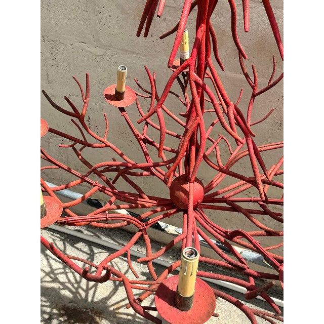 Illuminate your space with the captivating artistry of this vintage coastal coral branch chandelier, a unique lighting...