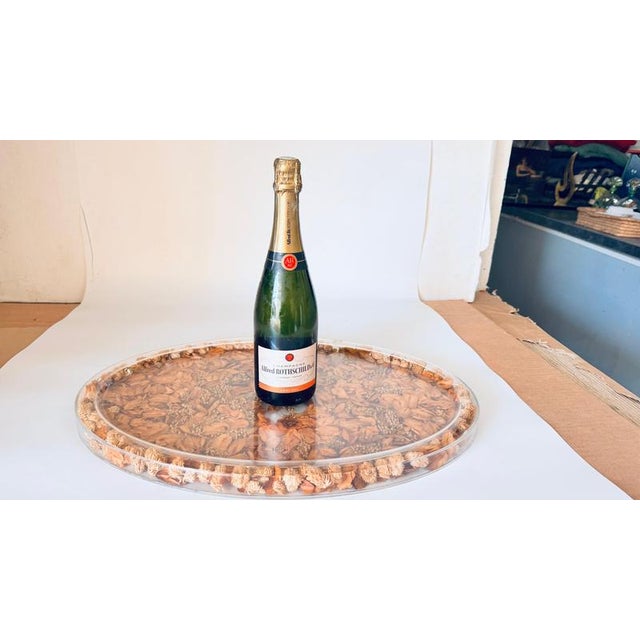 This vintage 1970s tray, crafted in Asia, is a beautifully designed hard plastic piece featuring real dried flowers and...