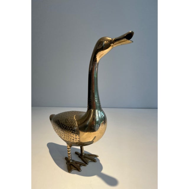 This beautiful decorative sculpture of a duck is made of brass. It is a French work, very finely chiseled. Circa 1970