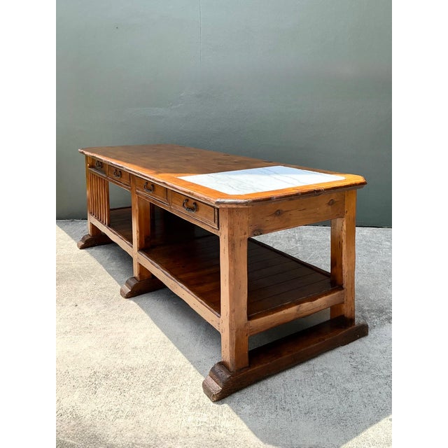 This vintage monumental console table is a striking statement piece, blending rustic craftsmanship with refined material...