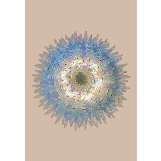 Palmette ceiling light made by 160 Murano blue and turquoise glasses in a gold metal frame. Murano blown glass in a...