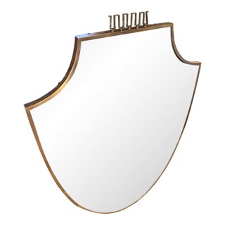 1950s Gio Ponti Style Mid-Century Modern Solid Brass Shield Shaped Wall Mirror For Sale