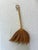 Handmade natural grass broom in a fantail design typical of Southeast Asia, with a loop in the handle for hanging,...