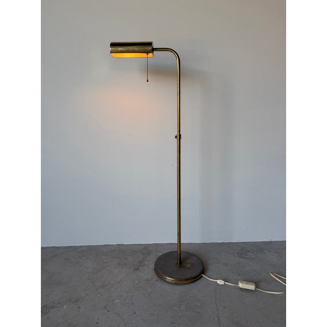 A sleek and sophisticated 1970s Mid-Century Modern floor lamp crafted in the style of Koch & Lowy. Featuring a minimalist...
