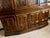 Beautiful solid wood Ethan Allen china cabinet featuring a classic breakfront design with an elegant arched crown and...