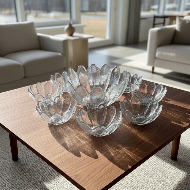 An iconic vintage 9-piece Blenko Lotus Bowl Set hand-blown in Milton, West Virginia during the late 1960s to early 1970s....