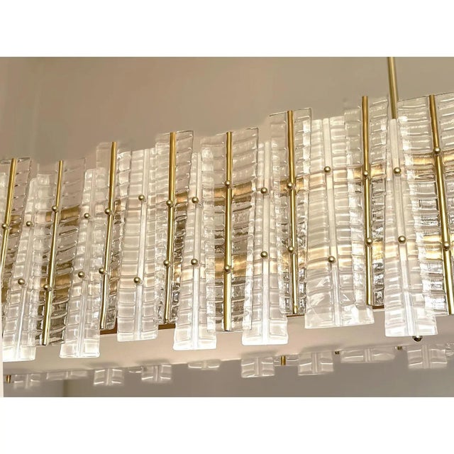 Contemporary gold chandelier in Murano Glass full of leafes that give a touch of "tropical" design. Extremally elegant and...