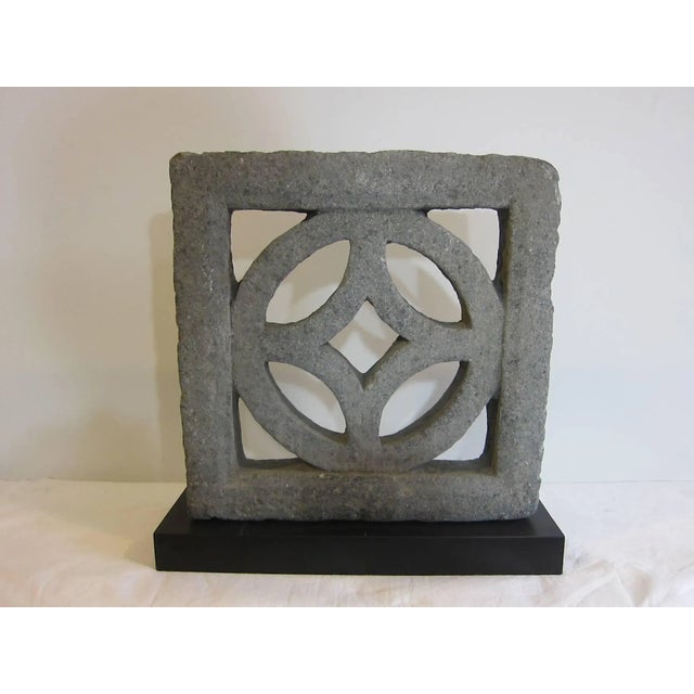Stone carved symbol for money. Chinese ancient symbol for money. A solid carved block of stone 3.5 inches thick. Possibly...